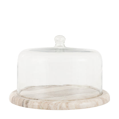 Glass cake dome with marble base on a white background